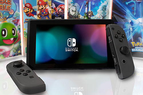 Edited photo with games in the background and nintendo switch screen in the front